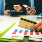 Close up view of a person holding a credit card