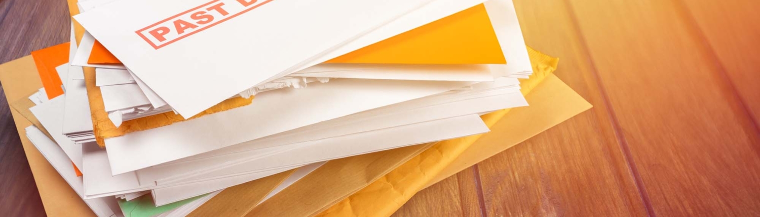 past due bills pile