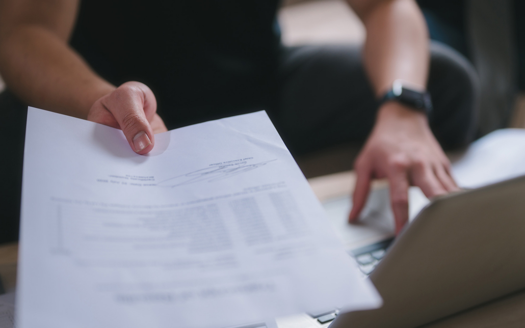 Man Hand Holding Or Handing Over Document